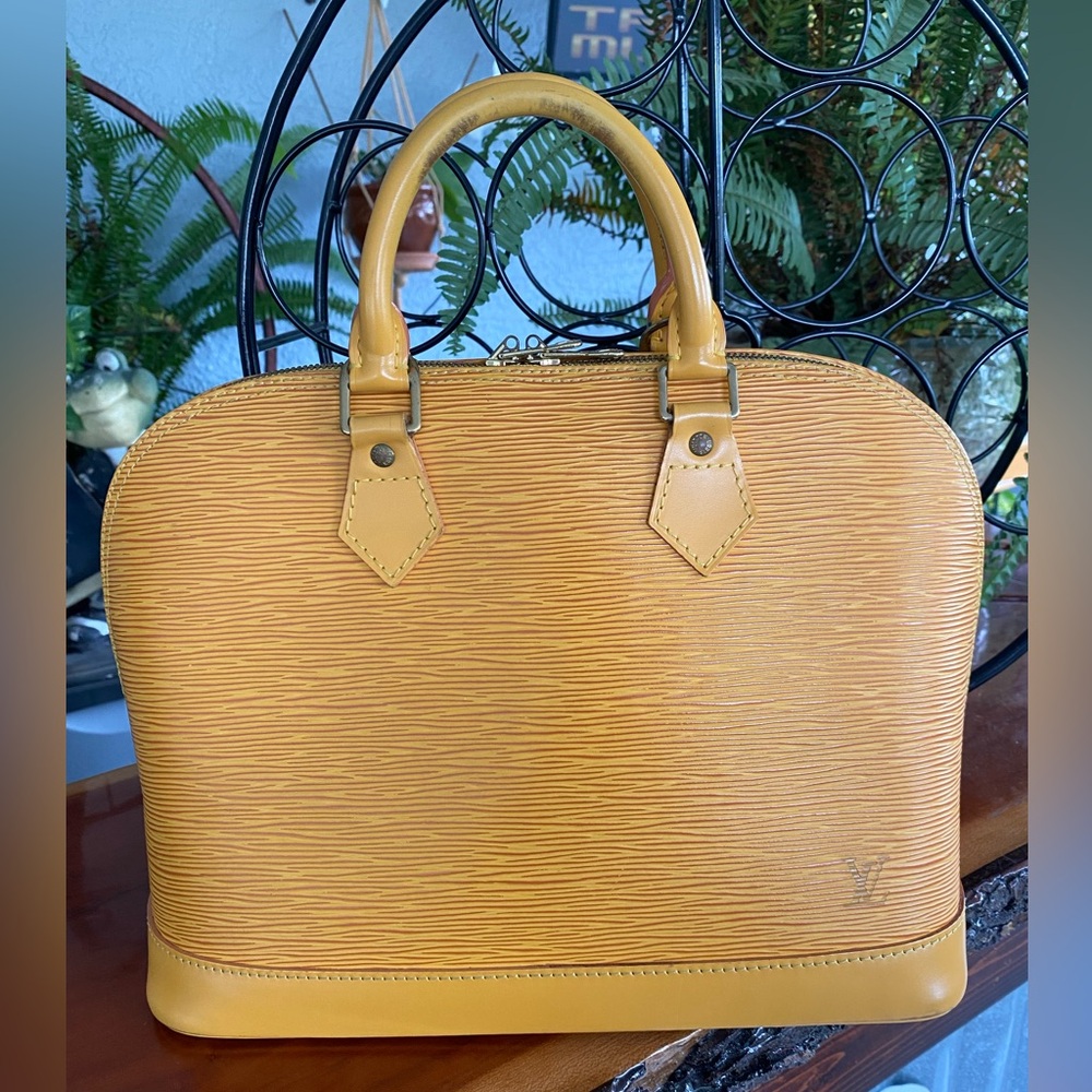 Authentic Louis Vuitton EPI Yellow Alma Handbag
